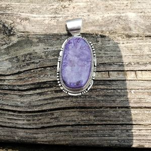 Sterling silver and charoite pendant